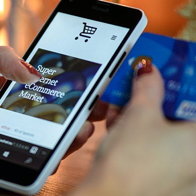 a woman scrolls on an ecommerce website on mobile