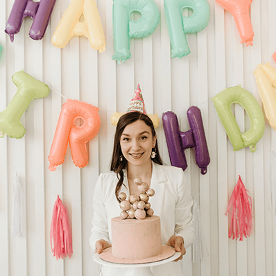 a woman celebrates a birthday
