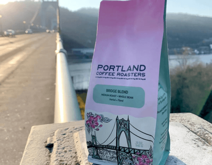 A bag of Portland Coffee Roasters coffee with a scenic background